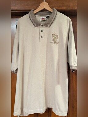 Vintage Disney Men's Tan Polo with Contrasting Collar and Embroidered Logo